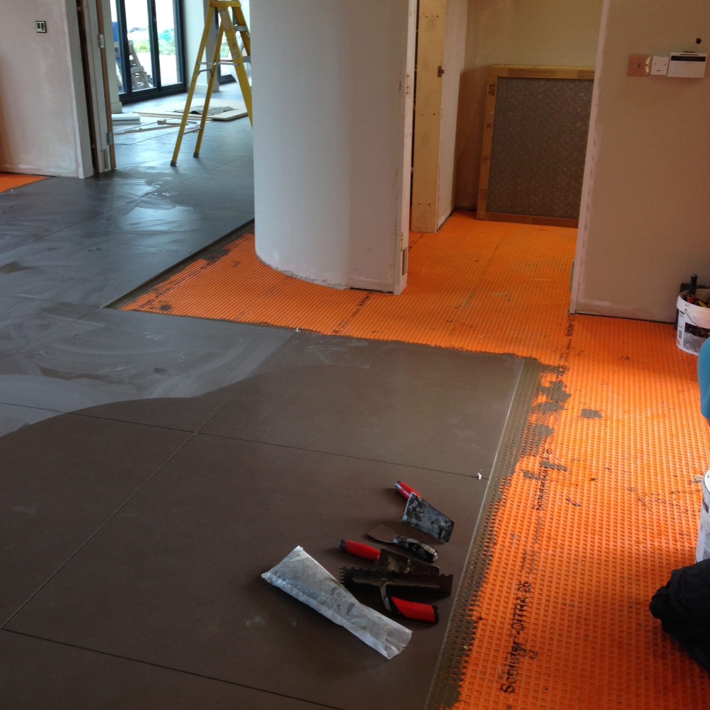 Large floor tile fitting
